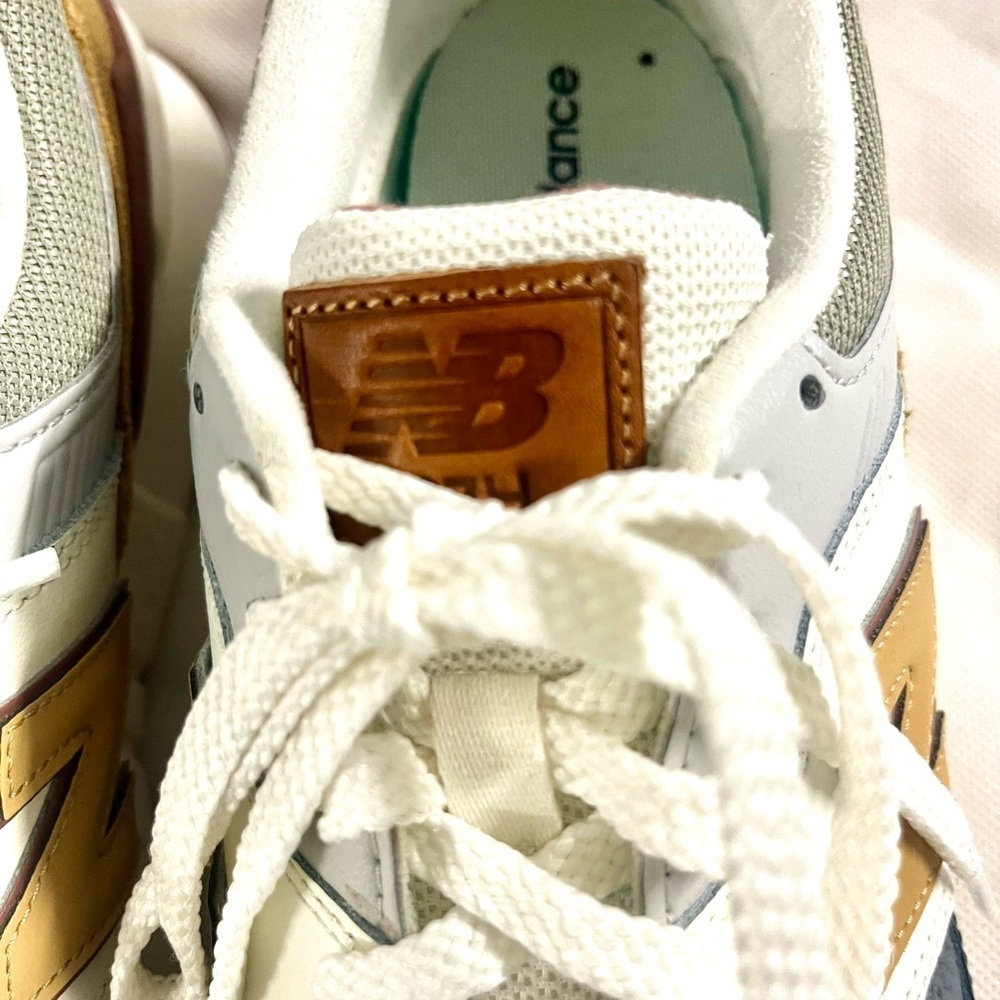 New Balance Beige and Navy Sneakers with Gold Accents - Picture 3 of 9